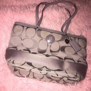 Coach bag. Slighty used. Still clean inside.